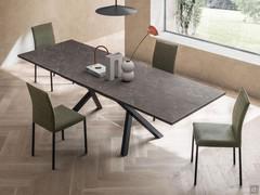 Ludwig rectangular extending table with folding extension and black painted metal base