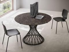 Amos table in round extendable version with top in Oriental HPL finish