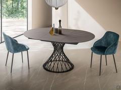 Amos extending round table in Gray Pulpis finish, with central folding extension