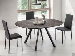 Arthur marble-effect extendable round table with four black anodised metal legs and layered HPL top