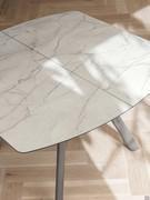 Arthur square extending table in layered HPL with Yule White finish