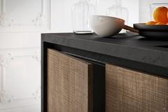 Detail of tranché-effect wood veneer doors and ecoresin top with matching grooves and sides