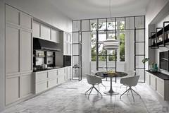 Linear kitchen with refrigerator, oven and microwave columns arranged on either side of the cooktop-sink-worktop