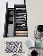 Detail of concealed drawer with cutlery holder