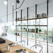 View of bookcase with floor-to-ceiling uprights and wood veneer shelves to match top and columns