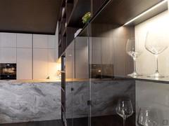 Bookcase with glass doors, the perfect space for glasses and bottles