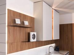 Wall panels with a thickness of 2,2 cm, made from Natural Walnut melamine with LED backlighting