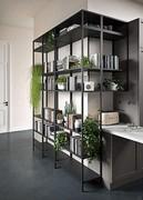 The kitchen can be complemented by custom-made shelving systems