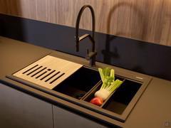 Detail of the Smeg sink with draining tray and tray to wash fruits and vegetables