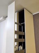 Detail of the pantry column with pull-out tray