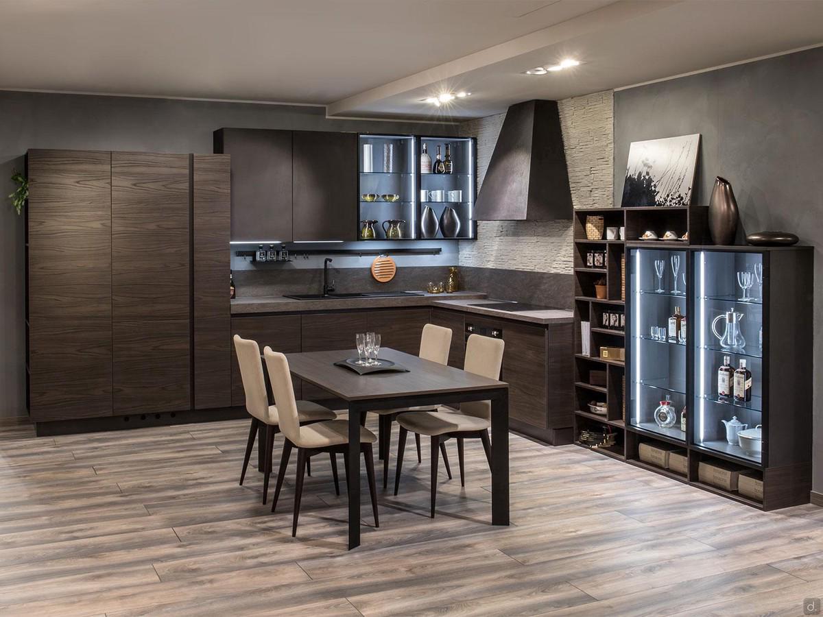 Corner modern kitchen with display case with two doors, wall units with glass doors and internal led lights