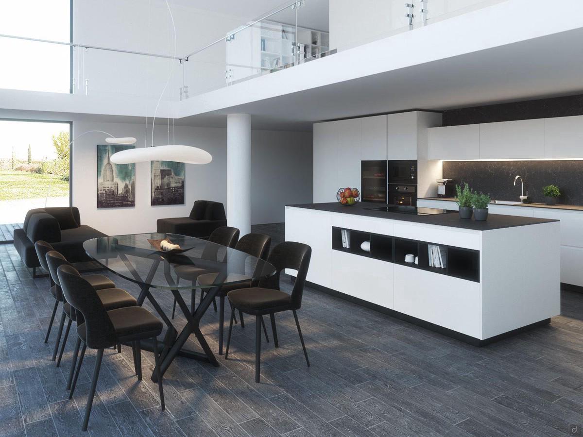 Open plan villa with black and white kitchen and island with cook top