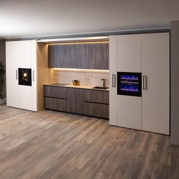 KLab 09 customised concealed kitchen with folding doors 