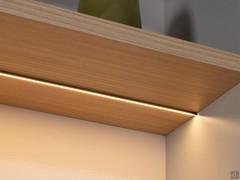 Led bar placed in milled in the lower part of the shelf