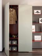 Hallway closet composed of 2 Plan Dove units with metallic lacquered door and interior in Amaranth Decor lacquer