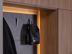 Open compartment equipped with wall-mounted backs made of smoked shaved NRF textured melamine melamine faced veneer