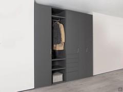 Wide module with doors and drawers combined with an open element and a hinged Focus Wide with Ellie handle.