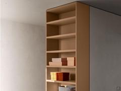 Thanks to the Wide side bookcase element, functional decorative spaces can be created by dynamically shifting from wardrobe to open area