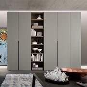 Wardrobe with built-in Wide bookcase positioned between two Midley door compositions