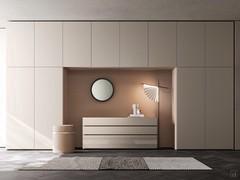 Wide bridge wardrobe - composition of hinged elements combined with the bridge element creating a niche with contrasting back panel