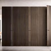 Slice is a hinged wardrobe with decorative band