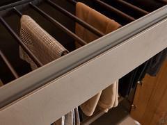 Detail of the pull-out trouser rack that comes with the same grip as the drawers