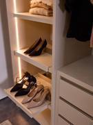 Pull-out shoe shelves to match the interior of the Pacific wardrobe, customisable in width and positioning in the compartment