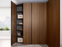 Pacific wardrobe interior with beveled corner, to be installed at the end of a linear or corner composition and fitted with 1 standard internal shelf