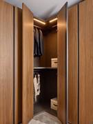 Pacific corner wardrobe with open corner doors. The particularly wide opening allows easy access to the internal compartments of the element