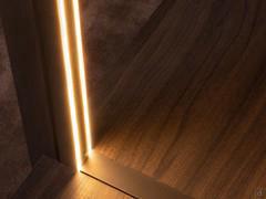 Detail of the LED light incorporated into the metal partition wall, optionally available to bring an original and functional light point into the Neptune Lounge structure