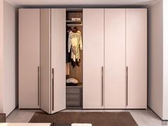 Front view of the Neptune Lounge wardrobe, in this case configured with single side hinged doors and a central double folding module.