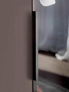 Neptune Lounge modular wardrobe with folding doors, detail of Glass handle in lacquered metal