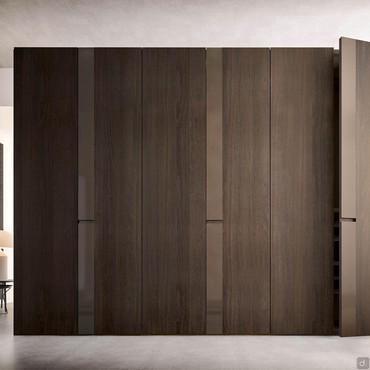 Slice is a hinged wardrobe with decorative band