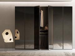 Midley Wide wardrobe in the version with grey mirror doors. The elegance of a mirrored wardrobe meets the functionality of the full-height groove in this case