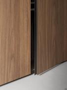 Detail of the full-height Midley opening, here proposed in a moka shine finish but available in other metallic colours or in the entire range of matt lacquers