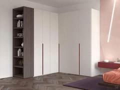 Midley wardrobe with white matt lacquered corner module and amaranth matt lacquered partial recess grip, combined with an end bookcase also from the Wide collection