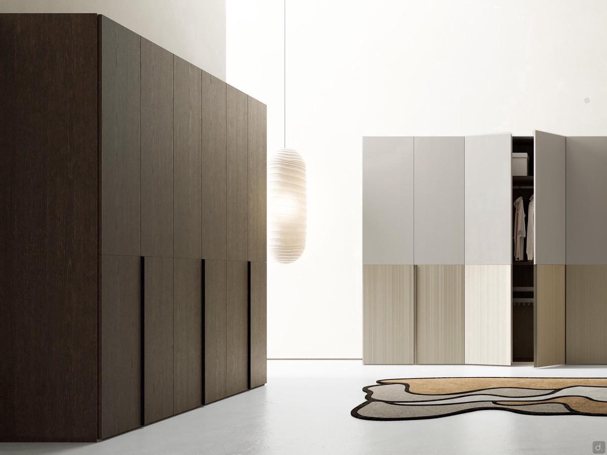 Ocean Wide wardrobe with curved lacquered metal groove handles. Single-coloured charcoal oak veneer on the left, combined with a matt lacquered bi-material base composition with bottom panels in polymeric barré