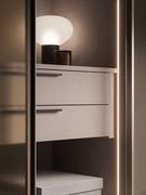 Detail of the suspended drawer unit in Oxford Sand melamine, with Z handle and vertical LED bar. All these accessories can be purchased in the tab dedicated to the internal equipment of the Wide hinged collection