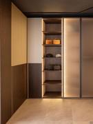 Wide column bookcase inserted between a corner module with Ocean door and a hinged element with Arctic door