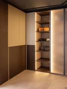 Ocean Wide hinged wardrobe in a composition that includes a hinged corner module with the same type of door, a Wide bookcase and an Arctic Wide module with glass door and metal frame