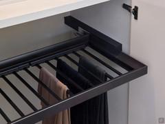 Removable trouser rack in umber shine, available depending on the module width chosen, with up to 16 slats