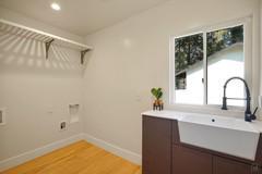 Laundry cabinet with wash basin