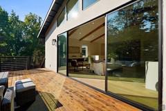 Detail of the veranda with access to the open space with kitchen and living room