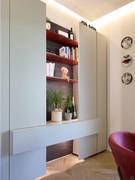 Living room cabinet with columns for bar corner, basket and shelves.