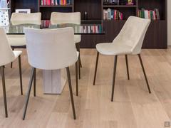 Dining chairs with velvet upholstered seat and painted metal legs