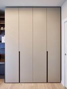 Matt lacquered wardrobe with 4 hinged doors.