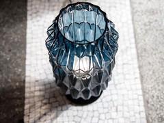 Detail of blue glass cylindrical lampshade in Art Nouveau style