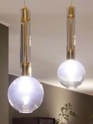 Detail of smoked glass diffusers with gold frame