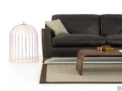 Jengo designer copper lamp next to the sofa