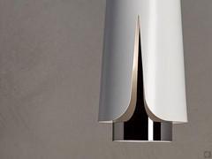 Detail of the matte white and gold diffuser